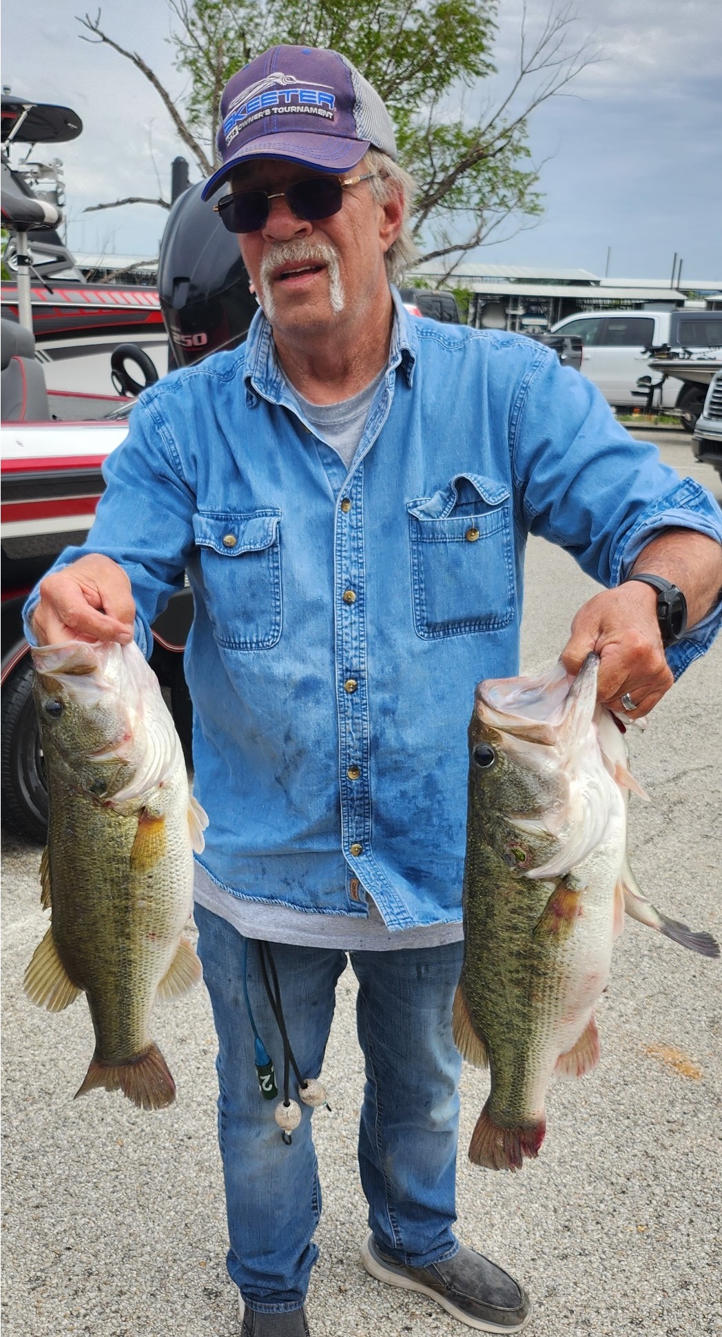 Bob Aldert with his and Jeremy's 4th place stringer of 12.64 lbs at Lake Lewisville!!
